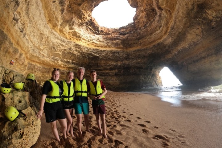 a group of people on a beach